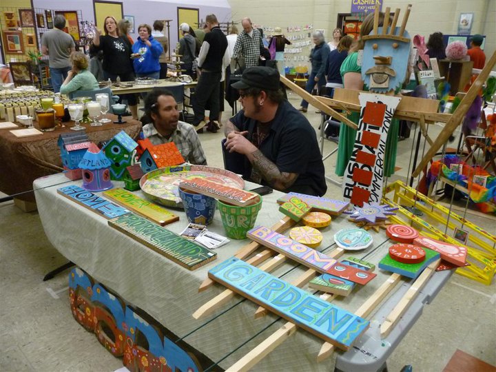 picture of me chatting with another artist at Lewis Elementary Garden Fair - 2011